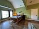 Spacious bedroom with vaulted ceilings, hardwood floors, and lots of natural light at 4530 Bogan Gates Dr, Buford, GA 30519