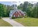 Beautifully landscaped home with a well manicured front yard at 4530 Bogan Gates Dr, Buford, GA 30519