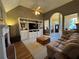 Inviting living room with fireplace, built-ins, and lots of natural light at 4530 Bogan Gates Dr, Buford, GA 30519