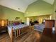 Spacious main bedroom featuring a bed, sitting area, and plenty of natural light at 4530 Bogan Gates Dr, Buford, GA 30519