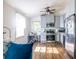 Bright kitchen featuring updated cabinets, stainless steel appliances, hardwood floors and open view to the living space at 110 Turman Se Ave, Atlanta, GA 30315