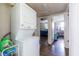 Efficient laundry area featuring a stacked washer and dryer, as well as hardwood style floors at 110 Turman Se Ave, Atlanta, GA 30315