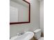 Clean bathroom features a vanity sink with updated faucet and a toilet at 169 Parkside Dr, Stockbridge, GA 30281