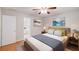 Comfortable bedroom featuring neutral colors, wood floors, and ensuite bathroom at 169 Parkside Dr, Stockbridge, GA 30281