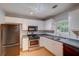 Well-lit kitchen featuring ample counter space and appliances at 169 Parkside Dr, Stockbridge, GA 30281