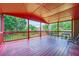 A cozy back deck with an outdoor seating area, ideal for enjoying the peaceful views of the backyard at 3363 Linton Ln, Marietta, GA 30066