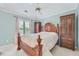 Serene bedroom with plush carpet, natural light, and beautiful wood furniture at 3363 Linton Ln, Marietta, GA 30066