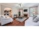 Inviting living room with hardwood floors, fireplace, and comfortable seating area at 3363 Linton Ln, Marietta, GA 30066