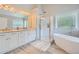 Spa-like bathroom with soaking tub, walk-in shower, and double vanity at 3363 Linton Ln, Marietta, GA 30066
