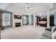 Spacious main bedroom with a fireplace, seating area, and elegant furniture at 3363 Linton Ln, Marietta, GA 30066
