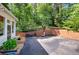 Backyard boasts a basketball court with views of the surrounding greenery at 3695 Highway 140, Rydal, GA 30171
