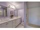 Stylish bathroom with double vanity sinks, white cabinets, and white subway tile in the shower at 3695 Highway 140, Rydal, GA 30171