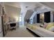 Attic bedroom with sloped ceiling, white walls, a work space, and black-out curtains at 3695 Highway 140, Rydal, GA 30171