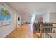 Spacious upstairs bonus room with hardwood floors, world map, and plenty of space for play and relaxation at 3695 Highway 140, Rydal, GA 30171