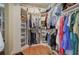 Walk-in closet with ample storage solutions including shelving, clothing racks, and storage baskets at 3695 Highway 140, Rydal, GA 30171