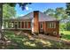 Back of house with screened in porch at 3695 Highway 140, Rydal, GA 30171