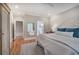 Bedroom features hardwood floors, neutral paint and ensuite bathroom at 3695 Highway 140, Rydal, GA 30171