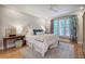 Spacious main bedroom with hardwood floors, natural light, and stylish decor at 3695 Highway 140, Rydal, GA 30171
