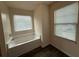 Well-lit bathroom boasts a large soaking tub and windows for natural light at 2335 Hackamore Dr, Atlanta, GA 30349