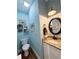 Powder room with blue walls, a granite countertop and decor at 2520 Hollonville, Brooks, GA 30205