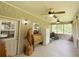 Screened-in back patio with ceiling fans and view to outside greenery at 2520 Hollonville, Brooks, GA 30205