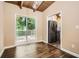 Charming dining area with deck access and seamless flow to the kitchen at 2648 Woodacres Ne Rd, Atlanta, GA 30345