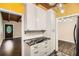 Spacious kitchen featuring modern cabinets and beautiful countertop with breakfast bar at 2648 Woodacres Ne Rd, Atlanta, GA 30345