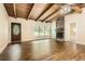 Bright living room featuring hardwood floors, a cozy fireplace, and an abundance of natural light at 2648 Woodacres Ne Rd, Atlanta, GA 30345