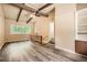 Bright living area with vaulted ceilings, ceiling fan, lots of light, and wood flooring at 2648 Woodacres Ne Rd, Atlanta, GA 30345