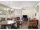 Living room with hardwood floors, ceiling fan, fireplace, and neutral walls at 3013 Nicholas Dr, Villa Rica, GA 30180