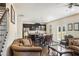 Open concept living room featuring hardwood floors, eat-in kitchen area, and modern finishes at 3013 Nicholas Dr, Villa Rica, GA 30180