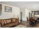 Open concept living room with hardwood floors and access to a modern kitchen at 3013 Nicholas Dr, Villa Rica, GA 30180