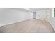 Large basement area with potential for various uses, featuring access to bathroom and closet at 4058 Daron Ct, Ellenwood, GA 30294