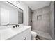 Modern bathroom with walk-in shower, sleek vanity, and contemporary fixtures at 4058 Daron Ct, Ellenwood, GA 30294