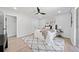 Stylishly decorated bedroom with wood-look floors, ceiling fan and neutral color palette at 4058 Daron Ct, Ellenwood, GA 30294