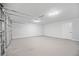 Spacious two-car garage with an automatic door and ample room for vehicles and storage at 4058 Daron Ct, Ellenwood, GA 30294