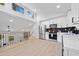 Modern kitchen featuring stainless steel appliances, white cabinets, and an open layout at 4058 Daron Ct, Ellenwood, GA 30294