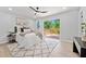 Comfortable bedroom with access to a private deck, a ceiling fan, and natural light at 4058 Daron Ct, Ellenwood, GA 30294