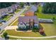 Spacious home with large yard, mature trees, and neighborhood views from above at 1043 Lexus Dr, Lawrenceville, GA 30045