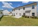 Spacious backyard with patio, trampoline, fire pit and rose bushes at 1043 Lexus Dr, Lawrenceville, GA 30045