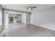 Open living room featuring new floors, recessed lights, and an easy transition to the kitchen area at 1043 Lexus Dr, Lawrenceville, GA 30045