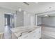 Spacious living room view showcases updated floors and paint, along with open access to adjacent rooms at 1043 Lexus Dr, Lawrenceville, GA 30045