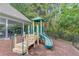 Community playground with slide and outdoor seating area under a pavilion, perfect for Gathering fun at 1043 Lexus Dr, Lawrenceville, GA 30045