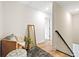 Hallway seating area featuring natural light and stylish decor at 201 Starr Cir, Stockbridge, GA 30281