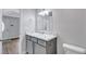 Bathroom featuring modern fixtures, and a marble vanity at 2084 Bethel Nw Dr, Atlanta, GA 30314