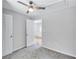 Bedroom featuring a ceiling fan, carpeted floor, and a doorway at 2084 Bethel Nw Dr, Atlanta, GA 30314