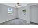 Comfortable bedroom with windows, carpet, and a closet at 2084 Bethel Nw Dr, Atlanta, GA 30314