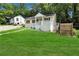 Inviting single-story home with a spacious front yard and mature trees at 2084 Bethel Nw Dr, Atlanta, GA 30314