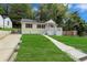 Attractive single-story home with a well-maintained lawn and sidewalk to the front door at 2084 Bethel Nw Dr, Atlanta, GA 30314