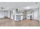 The kitchen boasts ample gray cabinets, modern appliances, and an open layout at 2084 Bethel Nw Dr, Atlanta, GA 30314